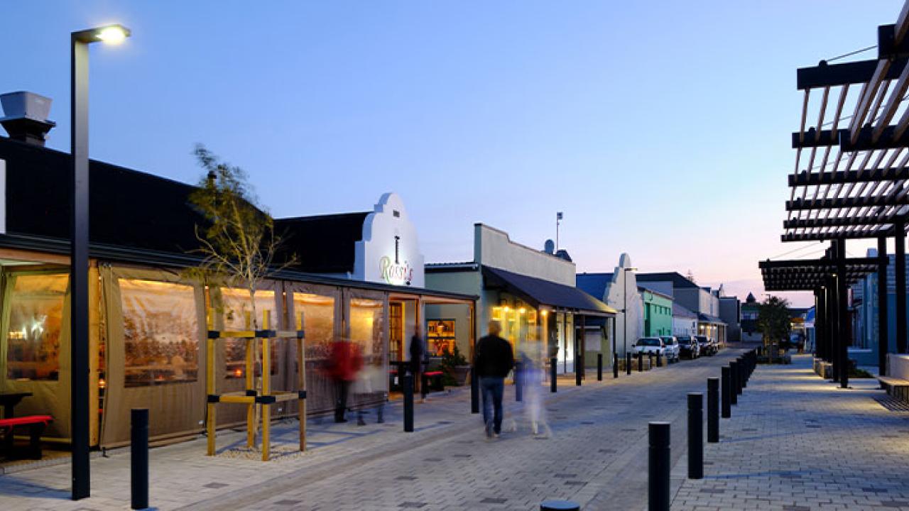 The elegant ELLEGA streetlight illuminates High Street in Hermanus, Western Cape Province.