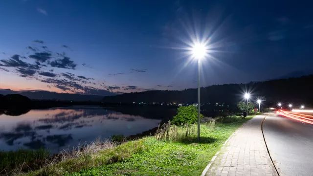 Post top luminaires illuminate Kingfisher Drive in Sedgefield in the Western Cape, South Africa. 