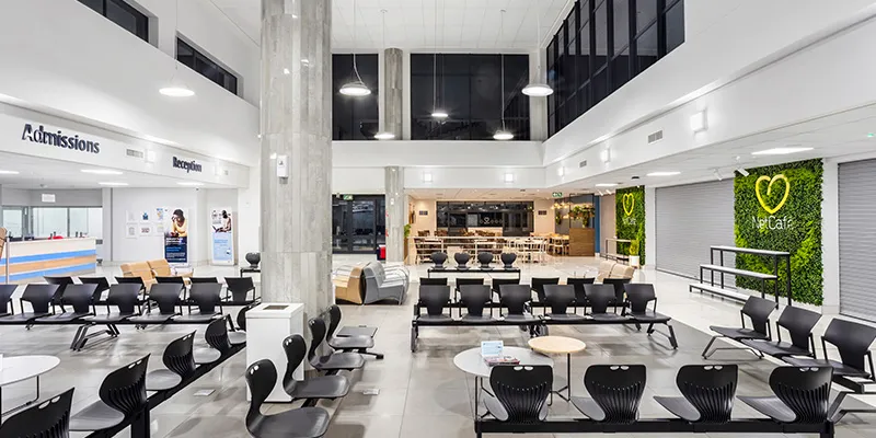 The big entrance hall and staircase in the reception area is illuminated by LEDDISK pendant luminaires.